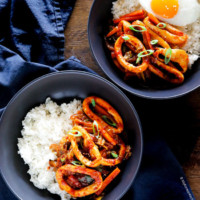 Two bowls of spicy squid rice