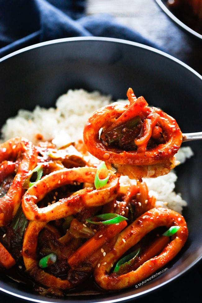 Spicy squid and rice scooped on a spoon
