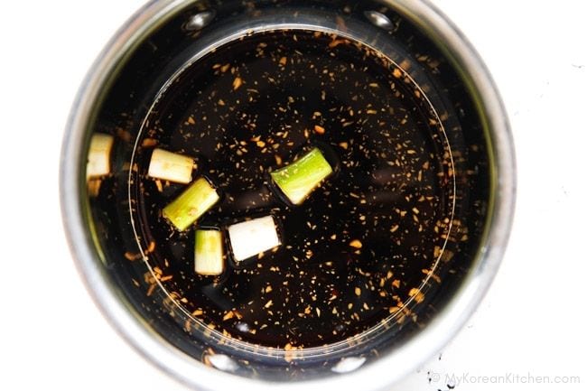 Teriyaki sauce boiling in a pot.