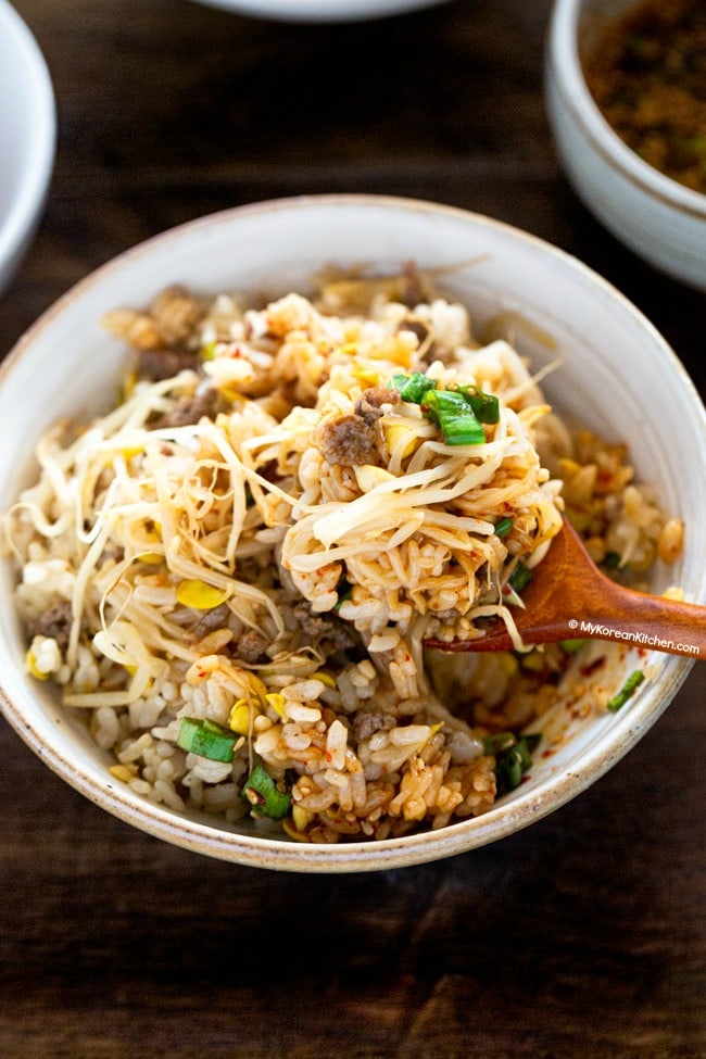 soybean sprout rice scooped on spoon
