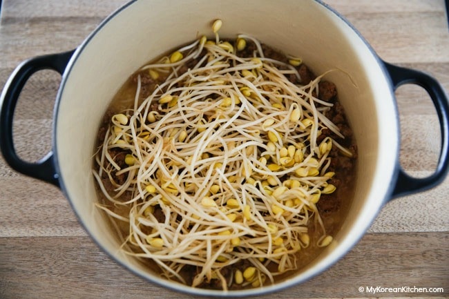 Kongnamul bap ingredients in a heavy bottomed pot