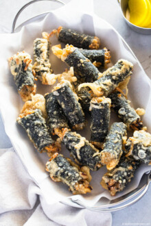 A close-up photo of gimmari piled on a serving plate.