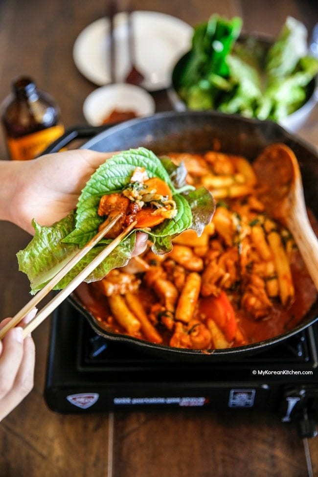 Dak Galbi (Korean spicy chicken stir fry) in a lettuce wrap | MyKoreanKitchen.com
