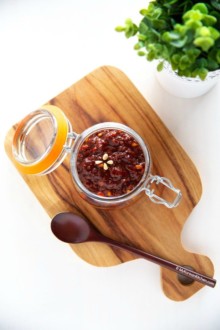 Yak Gochujang sauce stored in a glass jar.