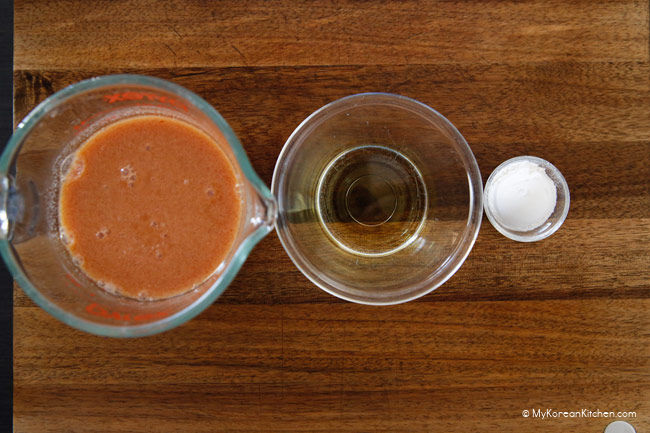 Omurice sauce ingredients lined up on a wooden board