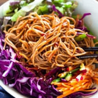 Bibim guksu servced with assorted vegetables