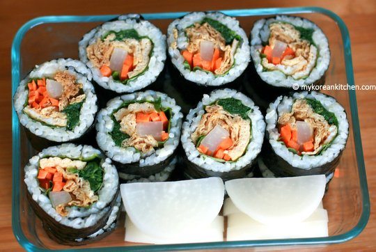 Korean Style Inari Roll (Yubu Kimbap). It's made with seasoned deep fried tofu pouches. Super delicious! | MyKoreanKitchen.com