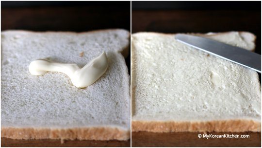 Squeezing and spreading mayonnaise on bread