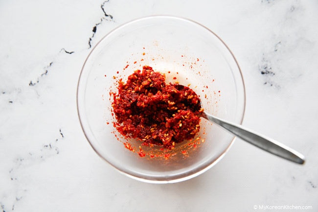 Oi Muchim sauce ingredients mixed in a small bowl.