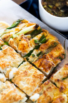 sliced pajeon served with Korean pancake dipping sauce