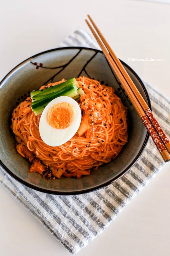 Spicy cold Kimchi noodles recipe - This is a perfect summer time dish. Bring your lost appetite back with these spicy cold Korean noodles! | MyKoreanKitchen.com