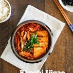 The classic Kimchi Jjigae (Kimchi stew) recipe with some fatty pork. When the fat from the pork melts into the soup, it becomes irresistibly delicious! | MyKoreanKitchen.com