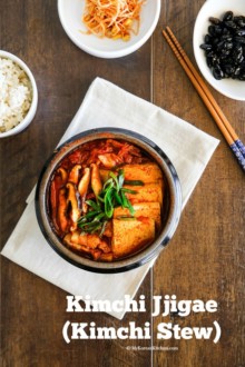 The classic Kimchi Jjigae (Kimchi stew) recipe with some fatty pork. When the fat from the pork melts into the soup, it becomes irresistibly delicious! | MyKoreanKitchen.com