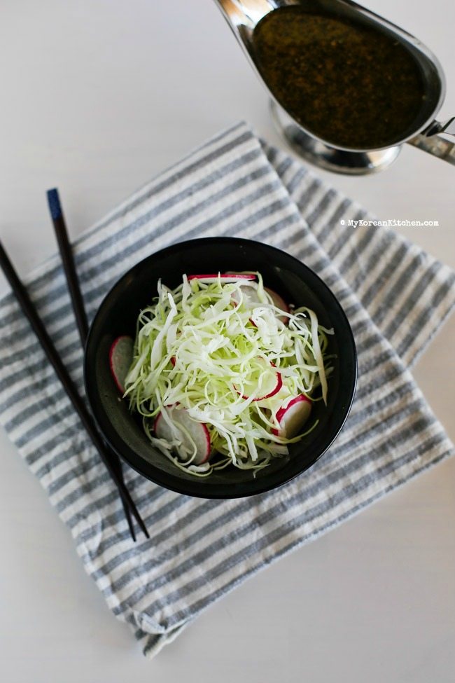 Sweet and Tangy Cabbage Salad - Cabbage and pink radishes served with sweet and tangy roasted sesame seed dressing. It's light, refreshing and crunchy! | MyKoreanKitchen.com