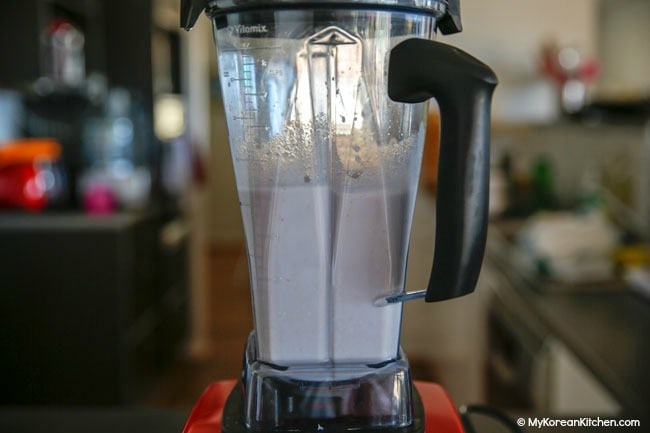 Blending roasted sweet potato with milk