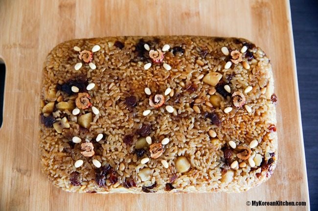 Yaksik placed on a wooden cutting board, ready for slicing.