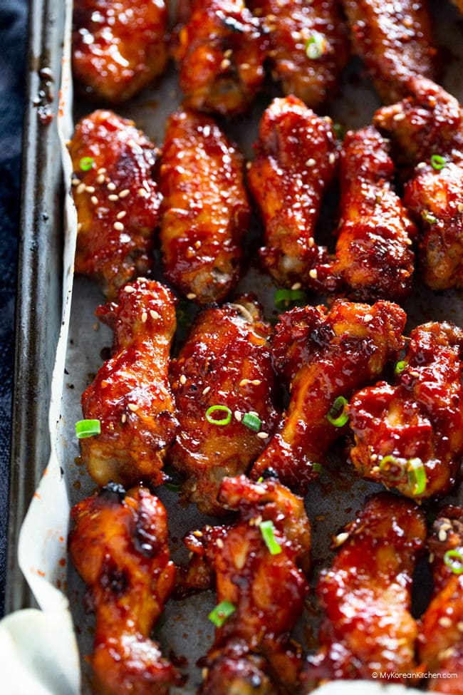 Baked Korean chicken wings lined on baking tray