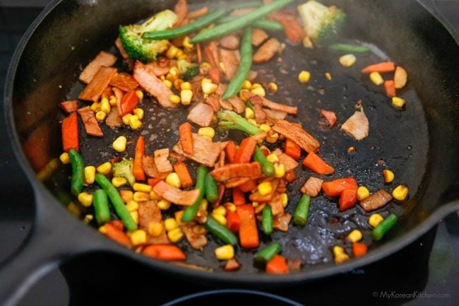 Easy Fried Rice - cooking vegetables with the sauce