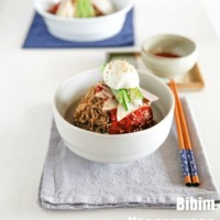 How to make classic Bibim Naengmyeon (Korean spicy cold noodles). They are spicy, sweet and tangy addictive noodle dish that is very popular in summer! | MyKoreanKitchen.com