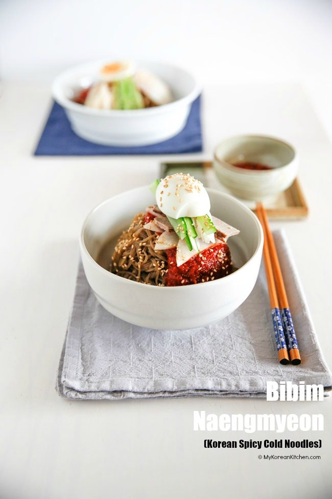 How to make classic Bibim Naengmyeon (Korean spicy cold noodles). A spicy, sweet and tangy addictive noodle dish that is very popular in summer! | MyKoreanKitchen.com