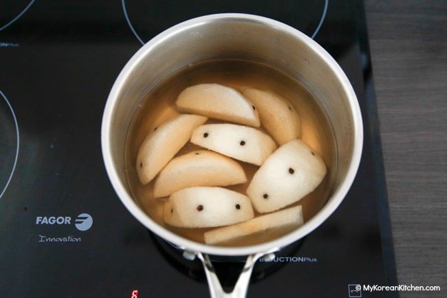 Poaching Korean pears in honey ginger syrup