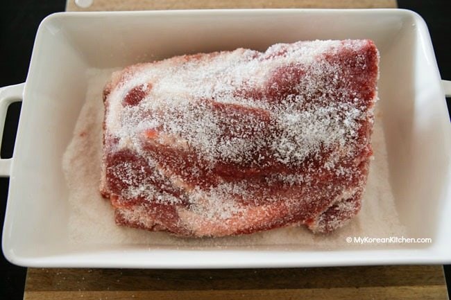 Curing pork shoulder with salt and sugar