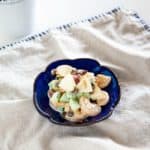 Korean fruit salad on a blue plate