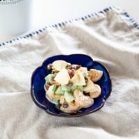 Korean fruit salad on a blue plate