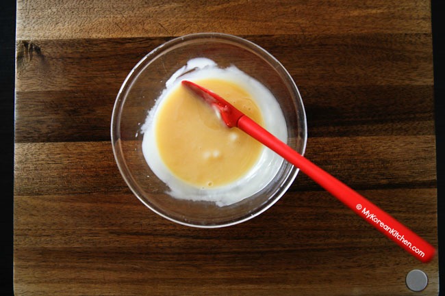Creamy fruit salad mayo dressing in a bowl