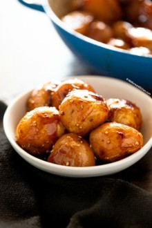 Braised potatoes in a shallow bowl