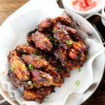 Korean chicken wings serve on paella pan