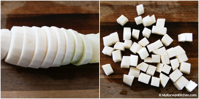 cubed daikon radishes on a wooden cutting board