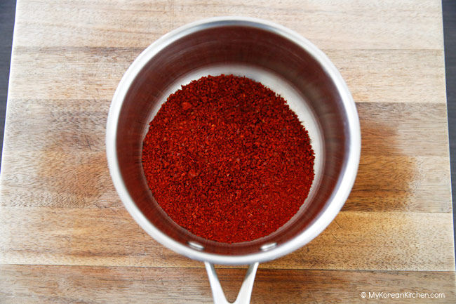 Korean chili flakes in a small stainless steel pot