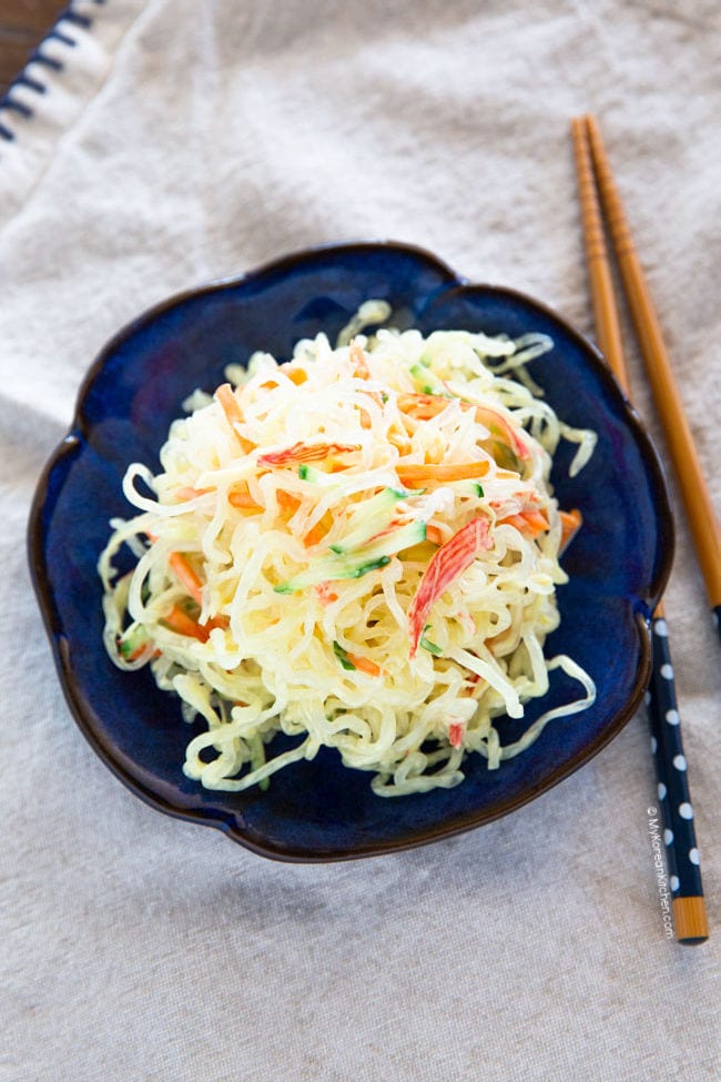 kelp noodle salad served on a blue plate