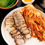Bite sized air fried pork belly served with kimchi