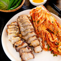 Bite sized air fried pork belly served with kimchi