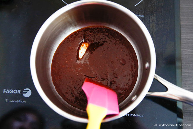 boiling spicy baby back rib sauce to thicken