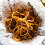 honey butter flavored dried squid served on parchment paper