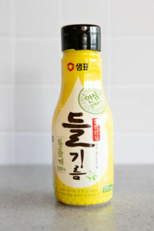Korean perilla oil in a yellow bottle