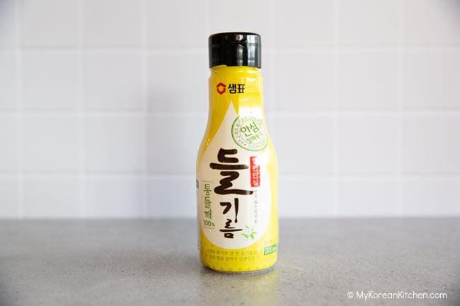 Korean perilla oil in a yellow bottle