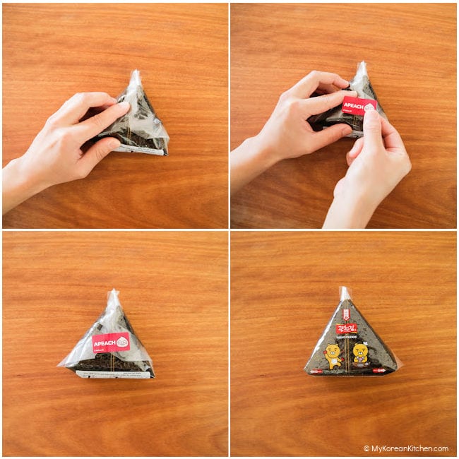 Putting a paper sticker on a triangle kimbap to hold down the seaweed wrap.