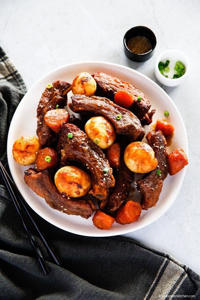 Instant pot pork ribs and vegetables, served on a plate.