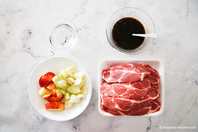 Korean BBQ Pork Ingredients - Marinade, Water, Pork, Chopped vegetables.