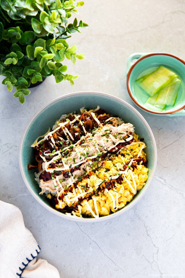 Tuna mayo rice served in a jade-colored bowl.