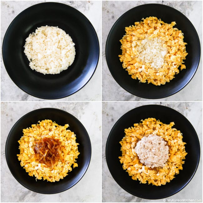 Assembling tuna mayo rice in a black pasta bowl just before serving.
