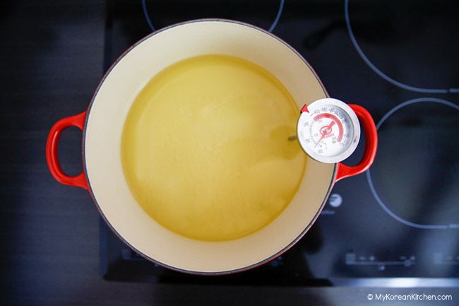 Deep-frying oil in a Dutch oven.
