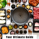 A vertical photo of a Korean BBQ table set up with various side dishes and meat.